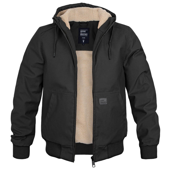 Black Alfie bomber jacket featuring a plush cream sherpa lining, drawstring hood, and durable outer shell for winter warmth.