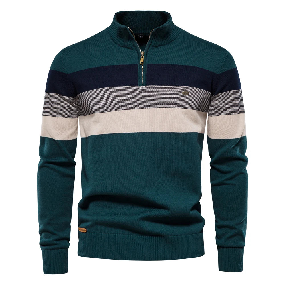 Men's teal quarter-zip jumper featuring a multi-colored striped chest design, ribbed collar, and soft knit fabric.