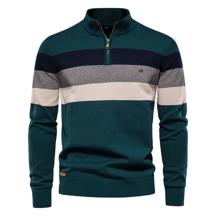 Men's teal quarter-zip jumper featuring a multi-colored striped chest design, ribbed collar, and soft knit fabric.
