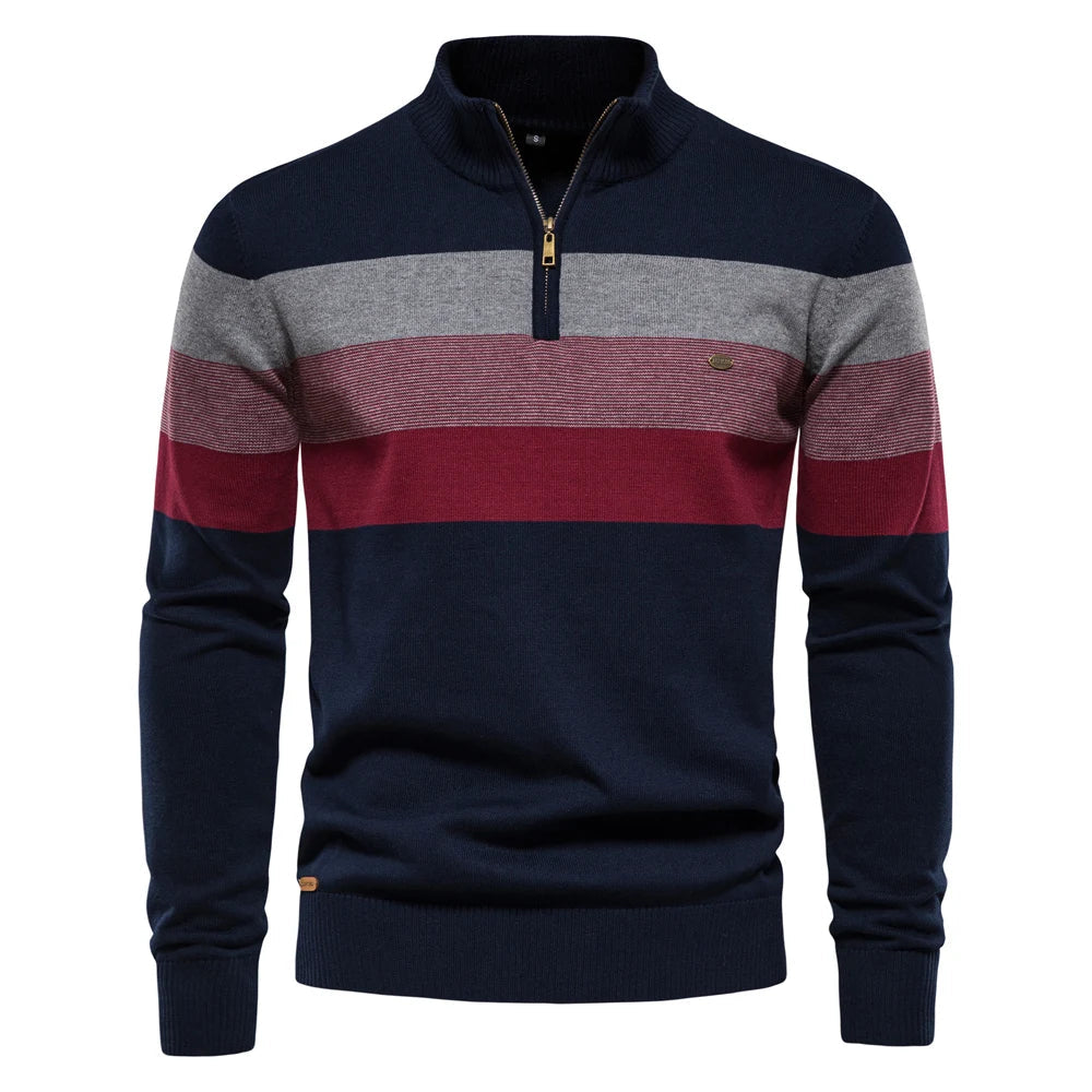 Men's navy, grey, and burgundy striped quarter-zip jumper in a soft knit with ribbed collar, cuffs, and hem.