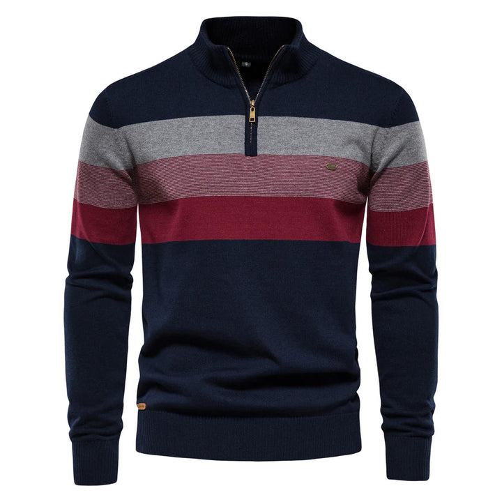 Men's navy, grey, and burgundy striped quarter-zip jumper in a soft knit with ribbed collar, cuffs, and hem.