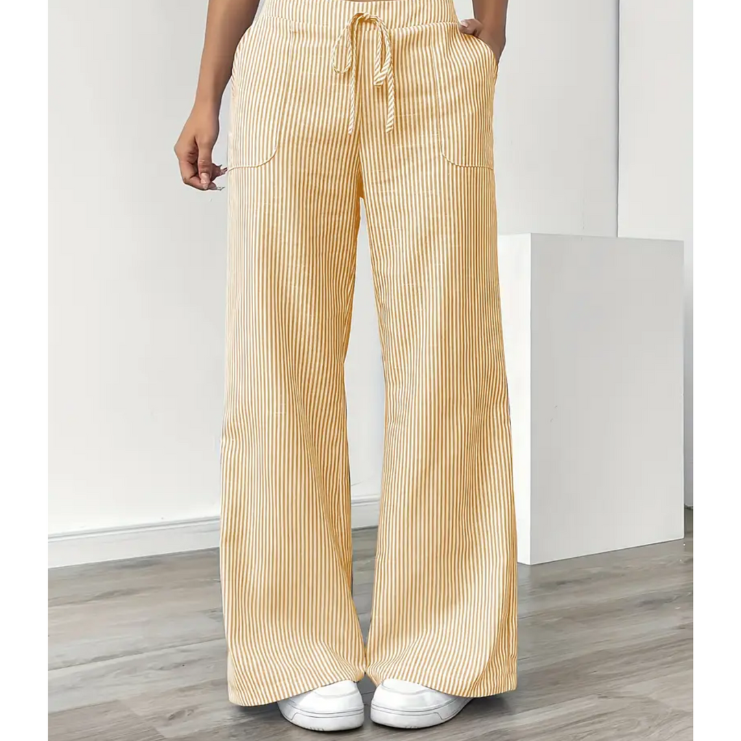 Yellow and white striped linen wide-leg trousers with a drawstring waist and side pockets.