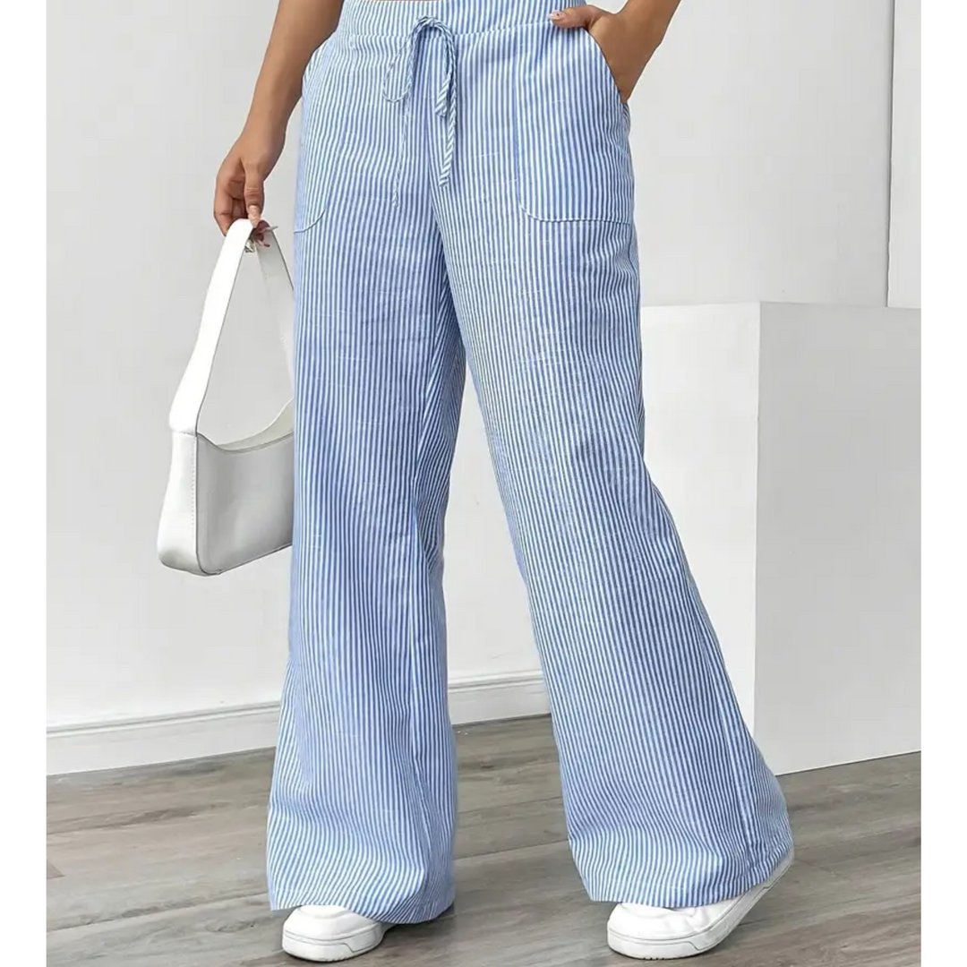 Blue and white striped linen wide-leg trousers featuring an adjustable drawstring waist and side pockets.