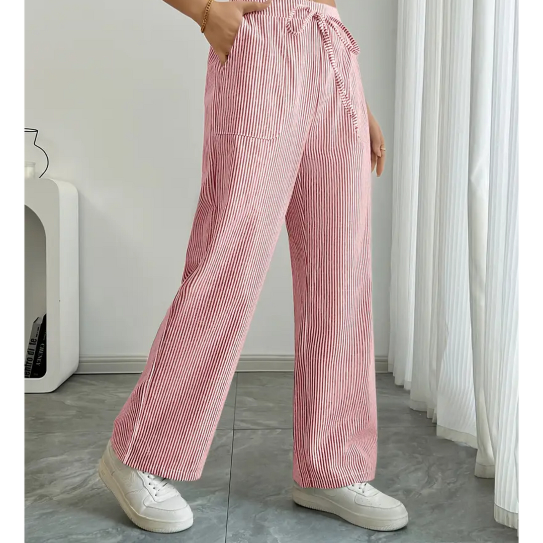 Women's wide-leg linen trousers in red and white vertical stripes with an adjustable drawstring waist and side pockets.