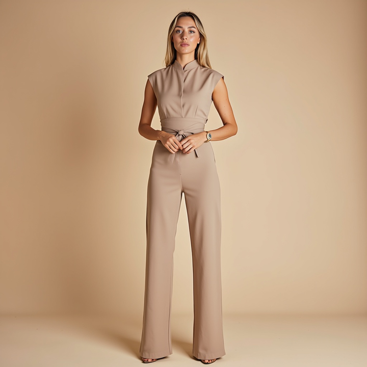 Amelia women's tie waist wide leg jumpsuit in a neutral color, offering a polished, put-together look.