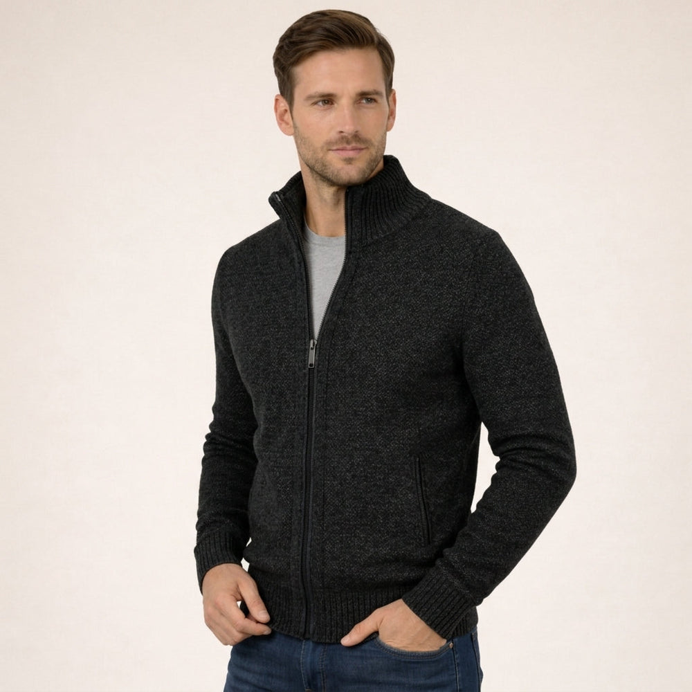 Charcoal marled merino wool full-zip jumper with a ribbed funnel collar and practical side pockets.