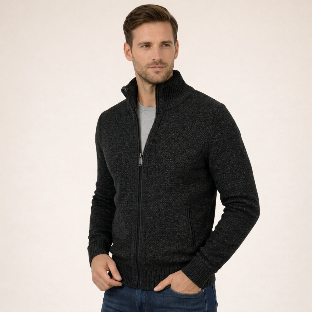 Charcoal marled merino wool full-zip jumper with a ribbed funnel collar and practical side pockets.