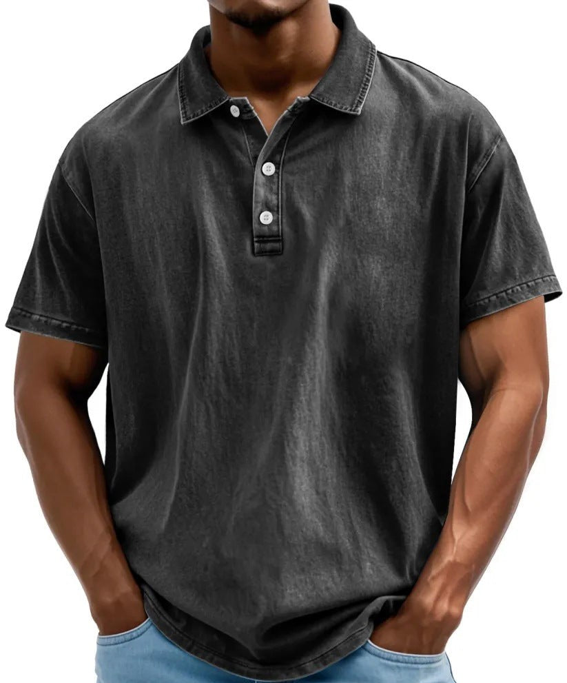 Men's charcoal vintage-washed polo shirt with a classic collar, two-button placket, and short sleeves.