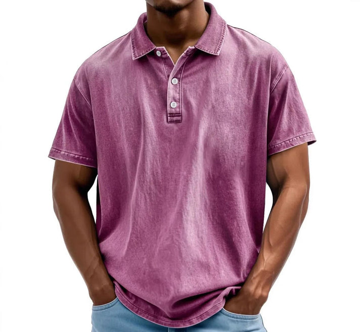 Men's vintage-washed purple polo shirt with a classic collar, two-button placket, and short sleeves.