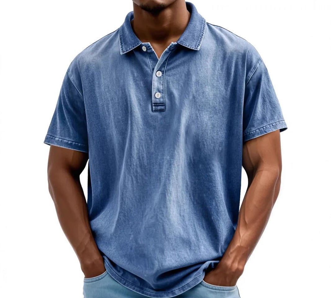 Blue vintage-washed polo shirt with a classic collar, two-button placket, and short sleeves on a man.