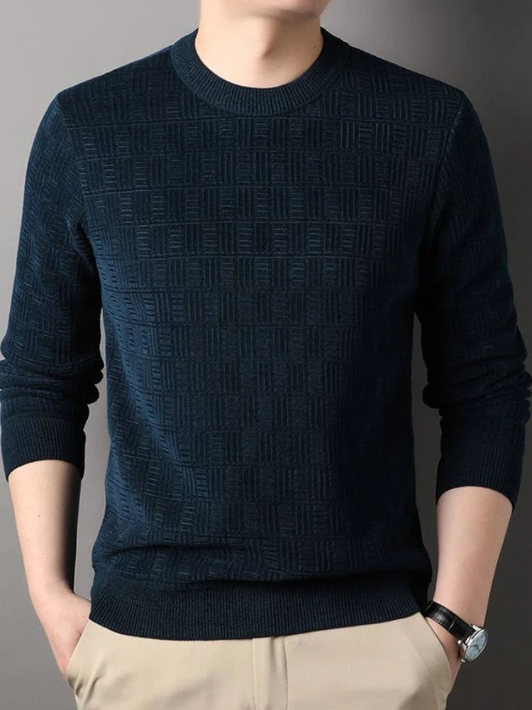 Navy blue men's crew neck jumper with a textured geometric knit pattern, ribbed cuffs, and hem.