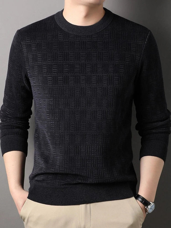 Black men's crew neck jumper featuring a refined geometric textured knit, ribbed cuffs, and a classic slim-fit design.