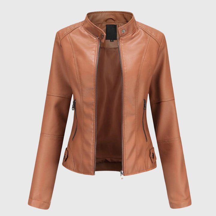 Tan faux leather biker jacket with a stand collar, front zip closure, and tailored seams on a light background.