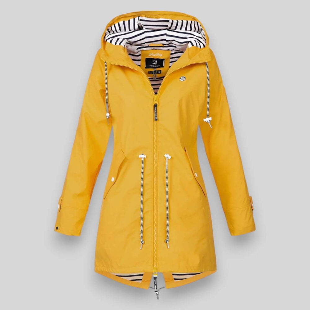 Yellow waterproof longline raincoat with an adjustable hood, drawcord waist, and navy striped nautical lining.