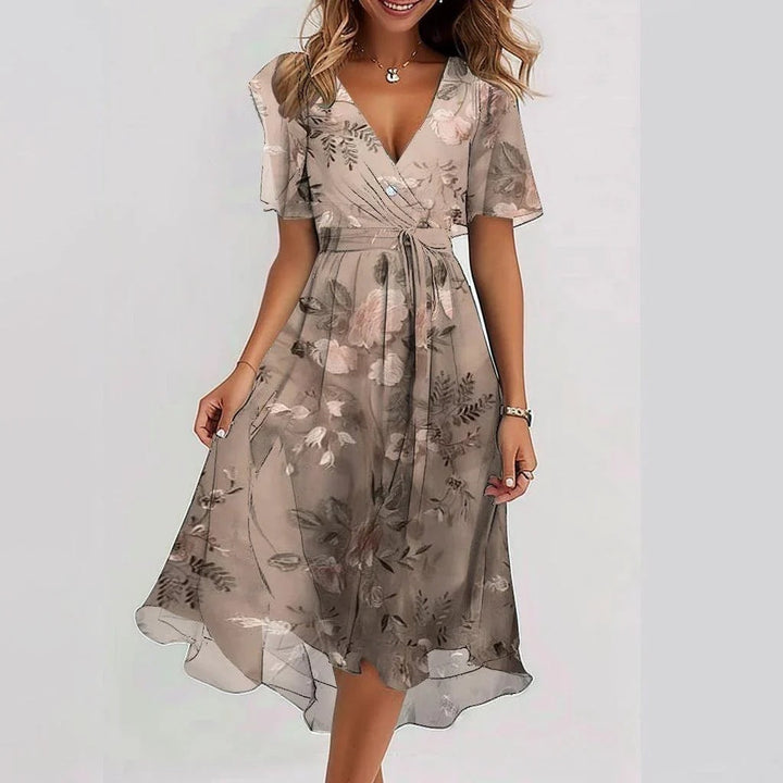 Beatrice women's flowy summer dress with a floral print, V-neck, and tie waist.