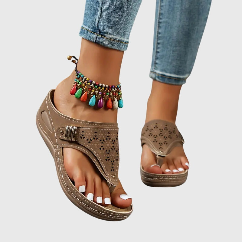 Bonnie women's orthopedic wedge sandals in taupe, featuring a laser-cut design, metallic buckle, and supportive footbed.