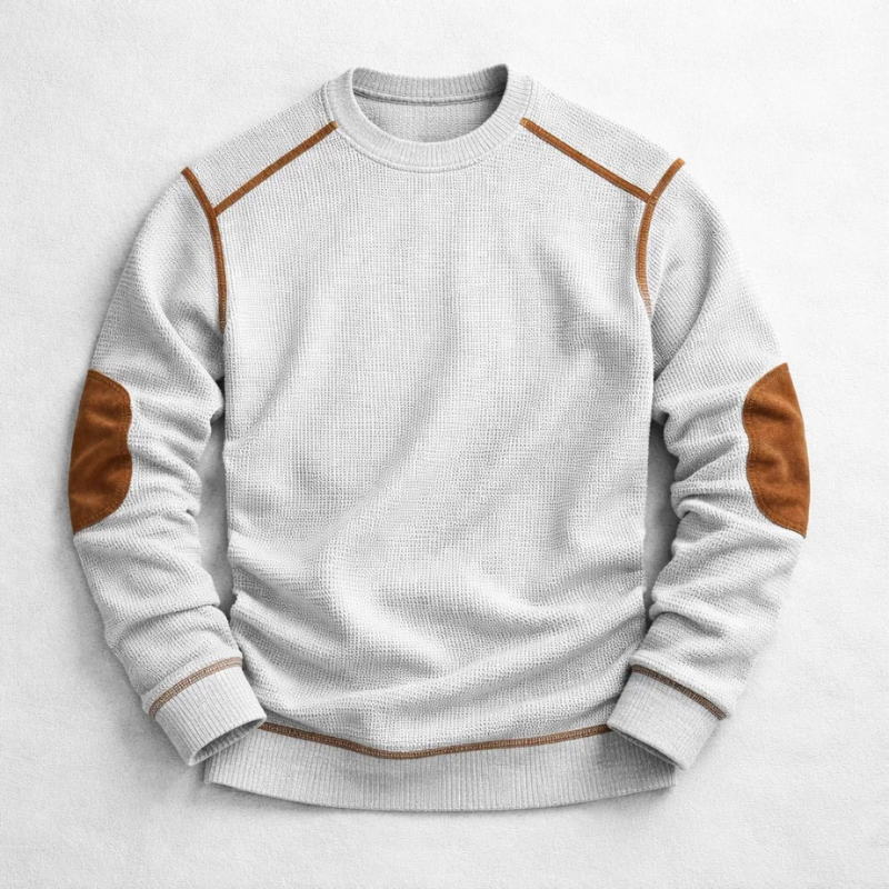 Light grey waffle-knit crew neck jumper with brown contrast elbow patches and shoulder detailing.
