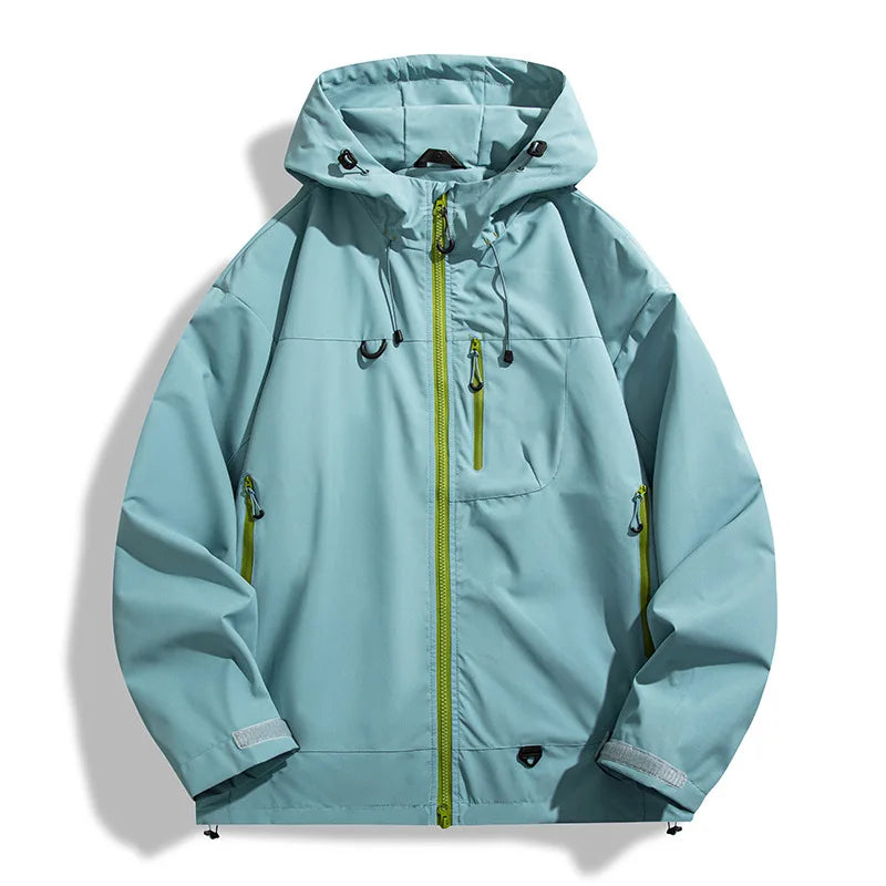 Light blue lightweight windbreaker jacket with a water-resistant shell, adjustable hood, and contrast lime green zippers.