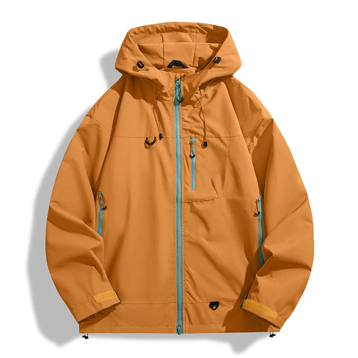 Mustard yellow lightweight windbreaker jacket with a teal zipper, adjustable hood, and secure pockets for all-weather wear.