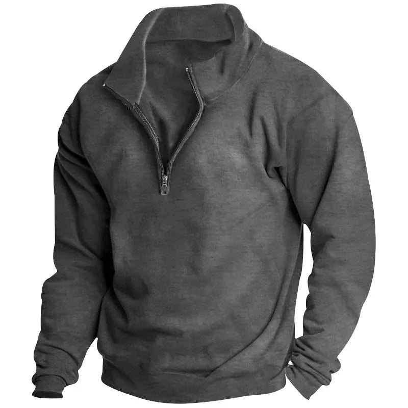 Charcoal grey men's quarter-zip sweatshirt with a soft fabric finish, ribbed cuffs, and a relaxed fit.