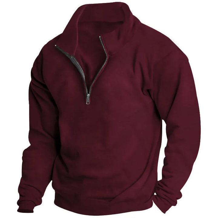 Men's burgundy quarter-zip sweatshirt with a soft fabric finish, ribbed cuffs, and a relaxed, comfortable fit.