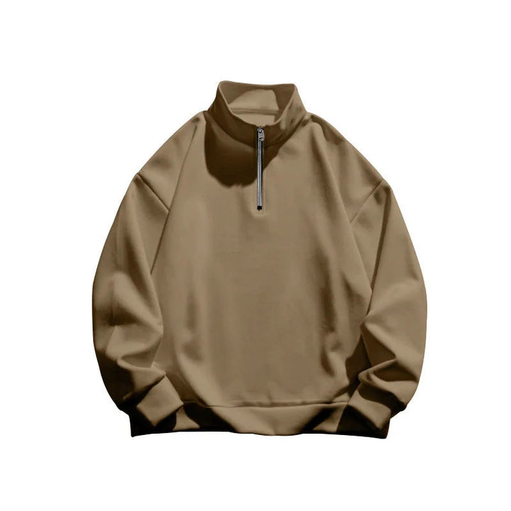 Tan men's quarter-zip sweatshirt with a relaxed fit, ribbed cuffs, and a silver zipper detail.