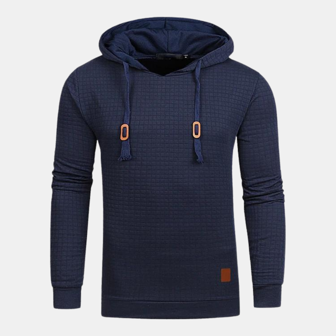 Navy blue men's textured waffle-knit hoodie with an adjustable hood, brown accents, and ribbed cuffs.