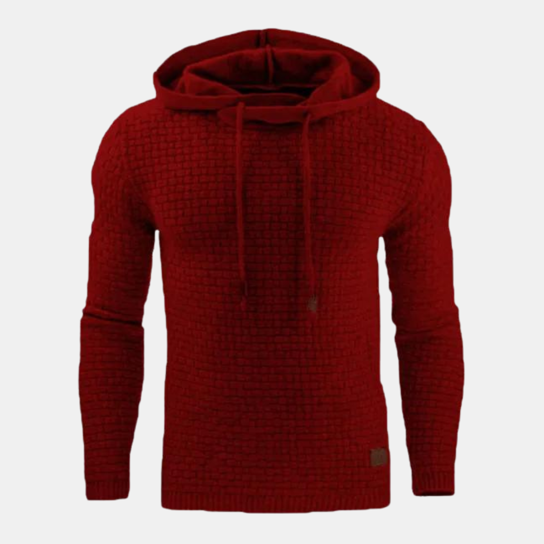 Deep red men's textured waffle-knit hoodie with an adjustable drawstring hood and ribbed cuffs.