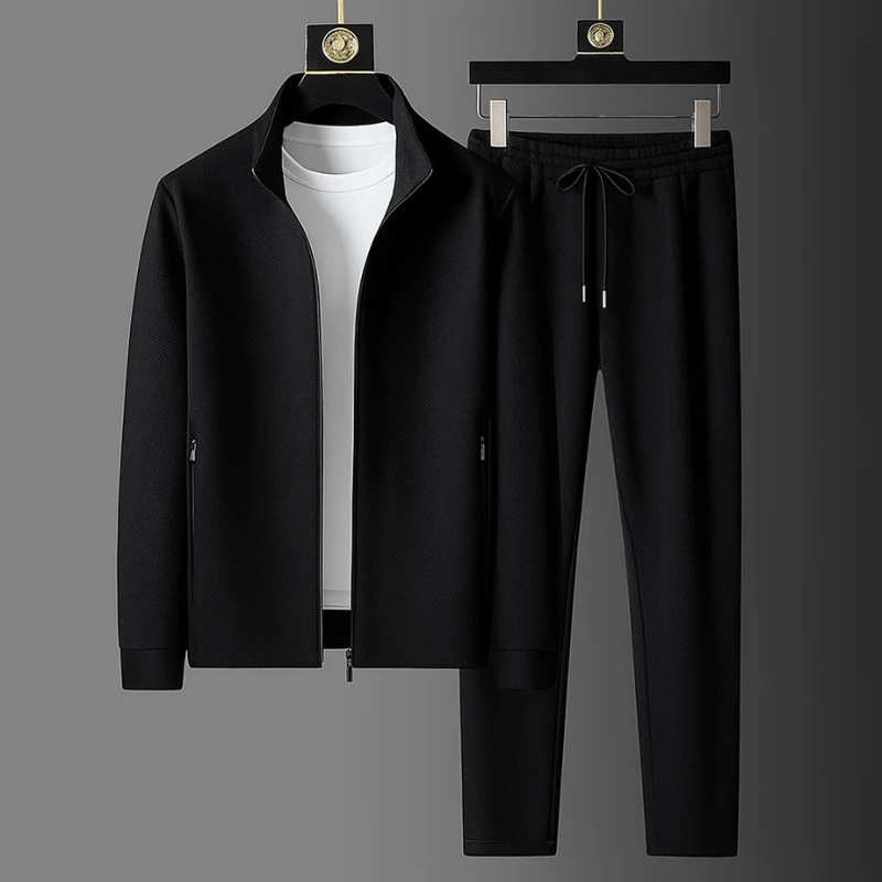 Black textured men's tracksuit set with a funnel-neck zip-up jacket and matching drawstring trousers.