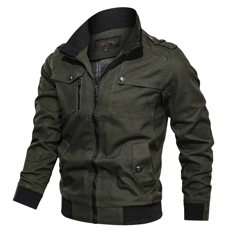 Olive green military field jacket with ribbed stand collar, full zip, chest pockets, and shoulder epaulettes.