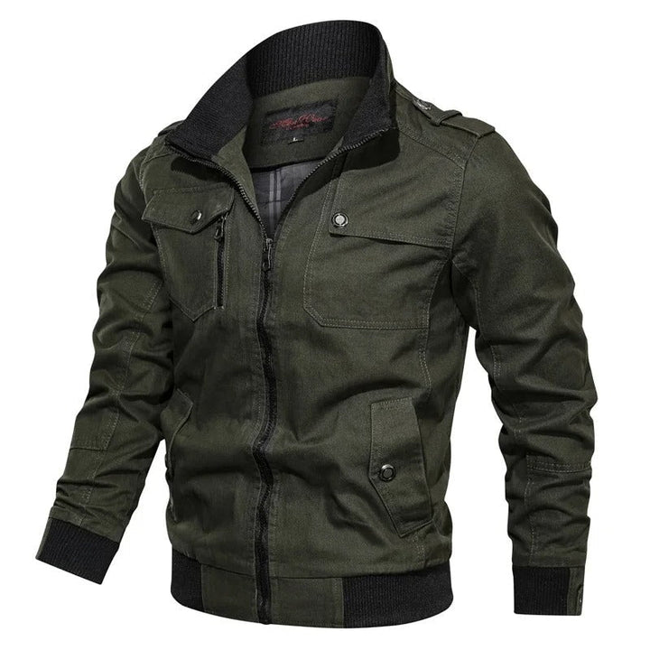 Olive green military field jacket with ribbed stand collar, full zip, chest pockets, and shoulder epaulettes.
