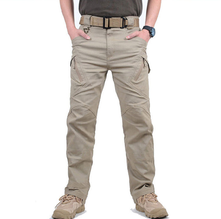 Khaki men's tactical cargo trousers with reinforced knees, multiple zip pockets, and a heavy-duty utility belt.
