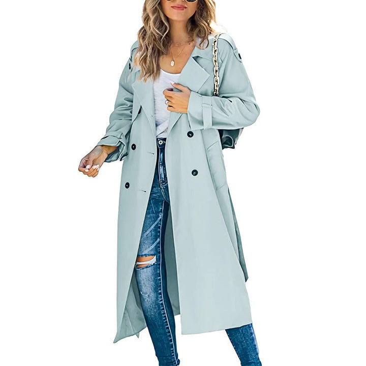 Elegant light blue longline trench coat featuring a classic double-breasted button front and notched lapels.
