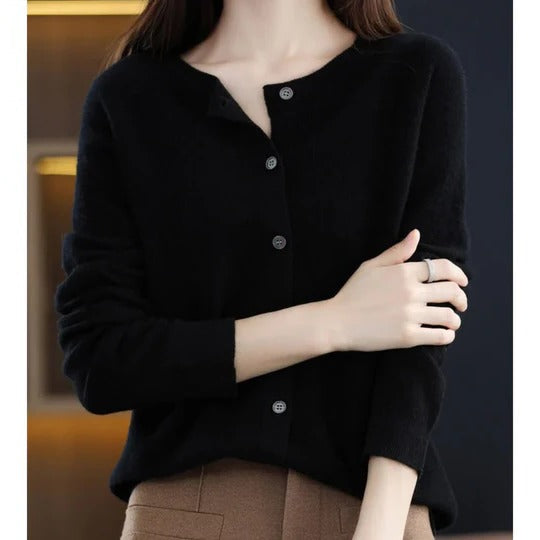 Elegant black fine-knit cardigan with a round neckline and neat front button closure for a polished, layered look.