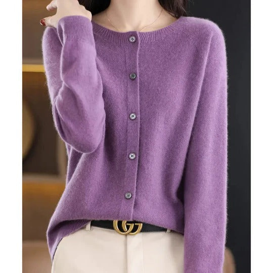 Soft purple round-neck cardigan in a fine knit with a polished button-up front and ribbed cuffs for effortless layering.