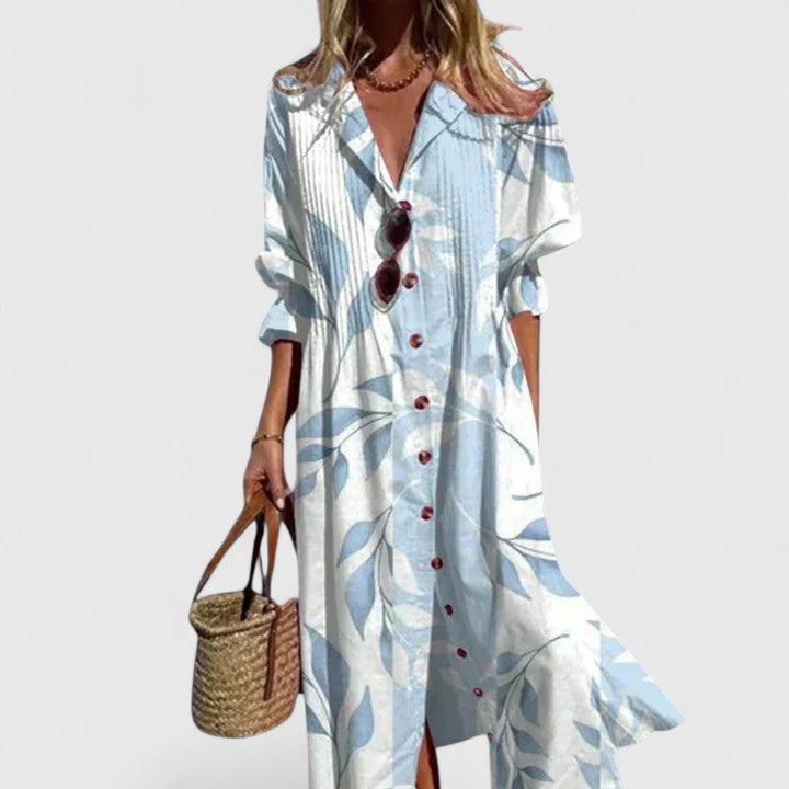 Cora women's boho maxi dress with blue leaf print, button-front, V-neck, and long sleeves.