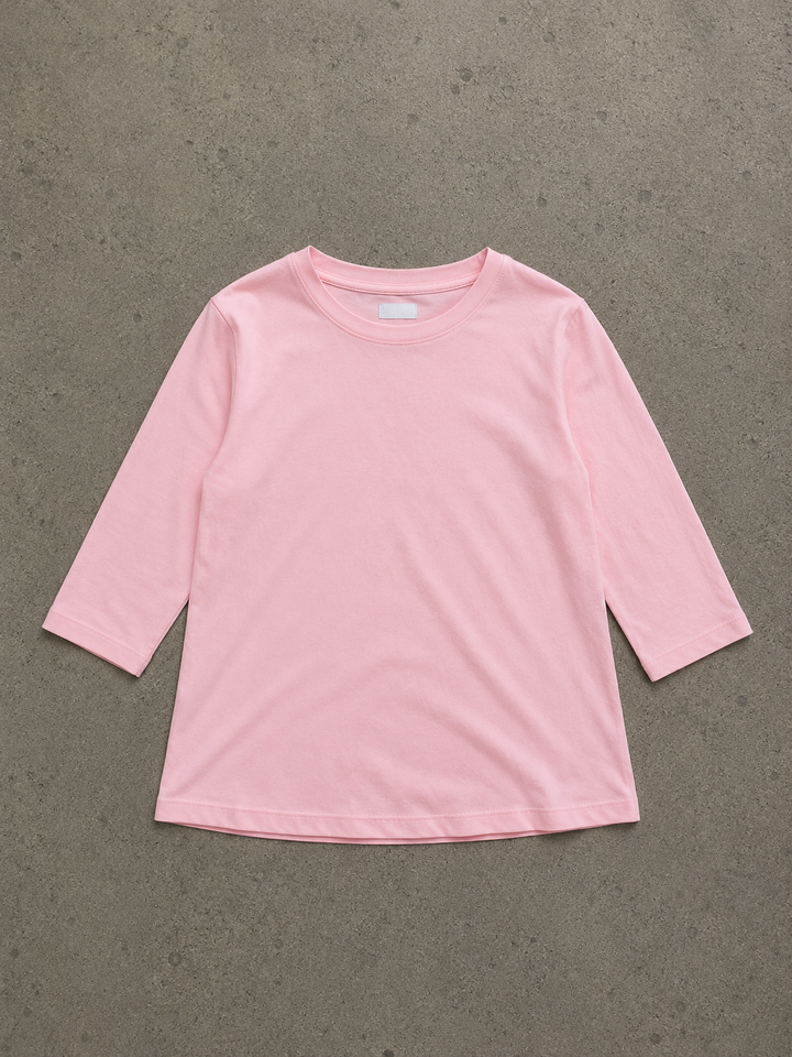 Soft pink Daisy top with a round neckline and half sleeves in a relaxed, lightweight cotton fit.