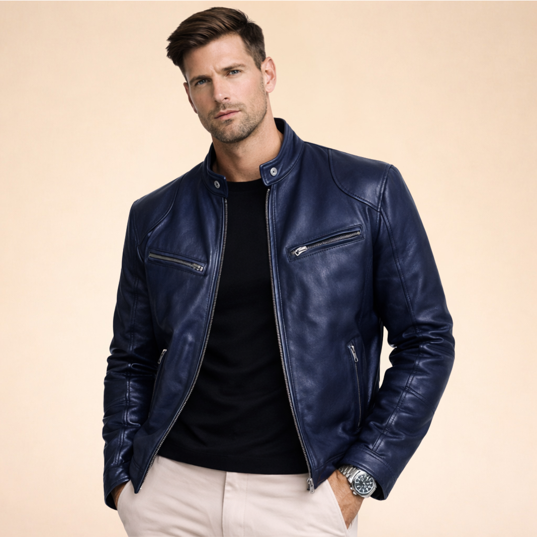 Damon slim fit navy faux leather moto jacket with a band collar, zip front, and chest pockets on a model.