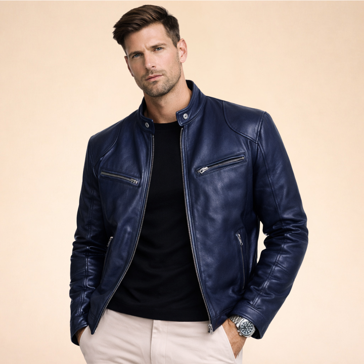 Damon slim fit navy faux leather moto jacket with a band collar, zip front, and chest pockets on a model.