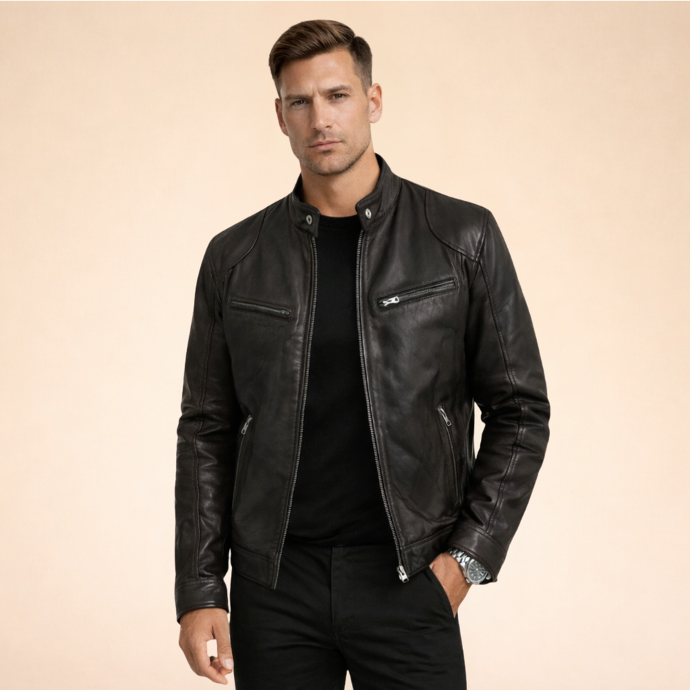 Damon slim fit black faux leather moto jacket with a band collar, snap tabs, and sleek zip-front pockets.