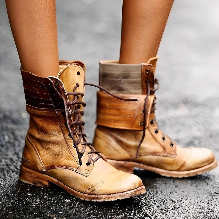Delia women's vintage ankle boots in weathered tan leather with a rugged lace-up design and durable textured outsole.