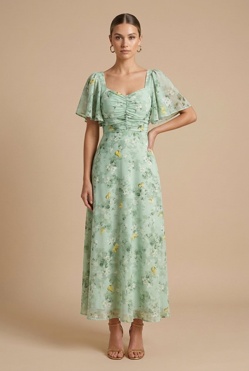 Delilah women's floral square neck maxi dress in soft green with flutter sleeves and ruched bodice.