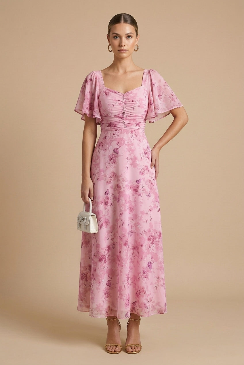 Delilah women's pink floral square neck maxi dress with ruched bodice and flutter sleeves.