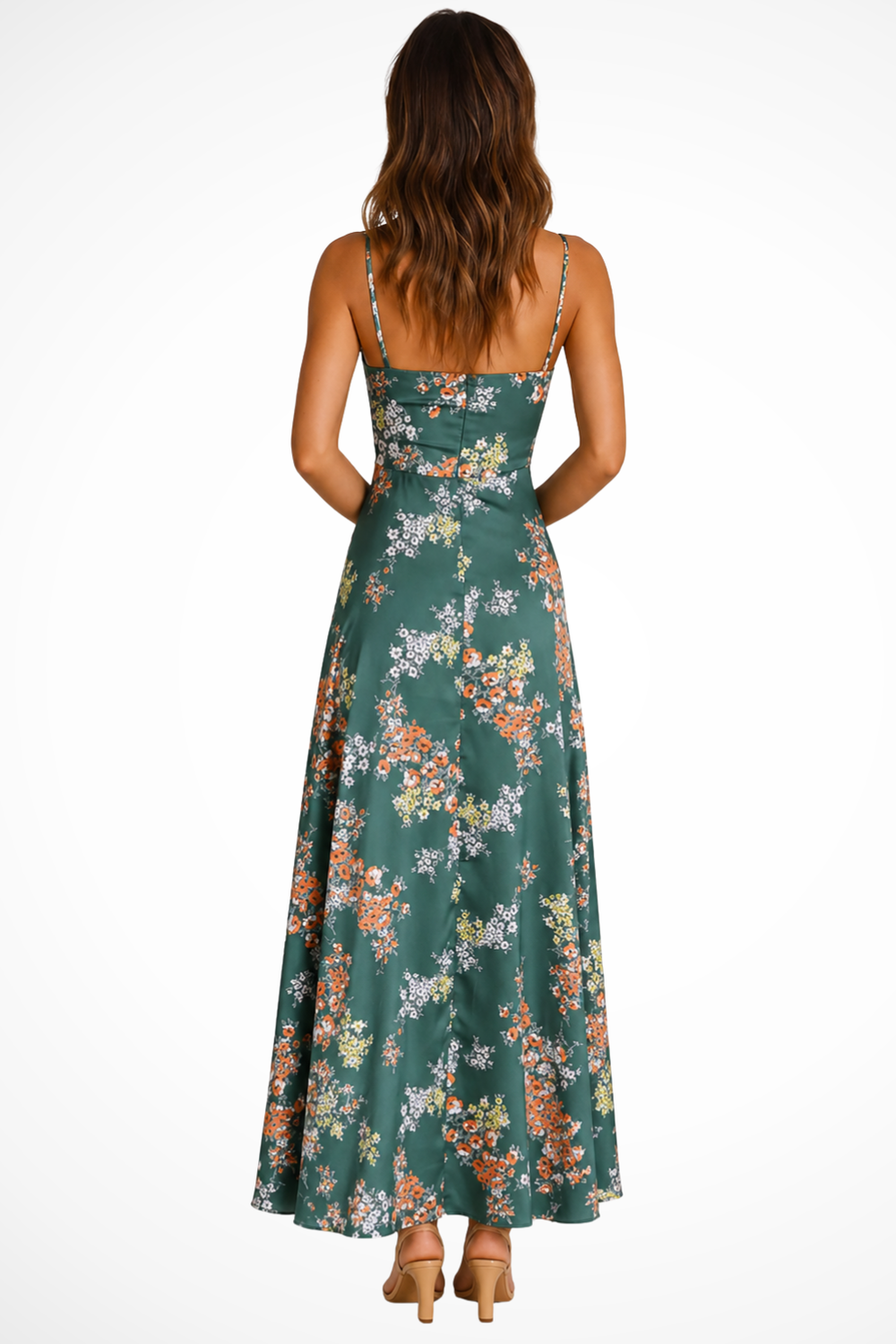 Back view of a green floral maxi dress with slender straps, a flowing A-line skirt, and a flattering fitted bodice.