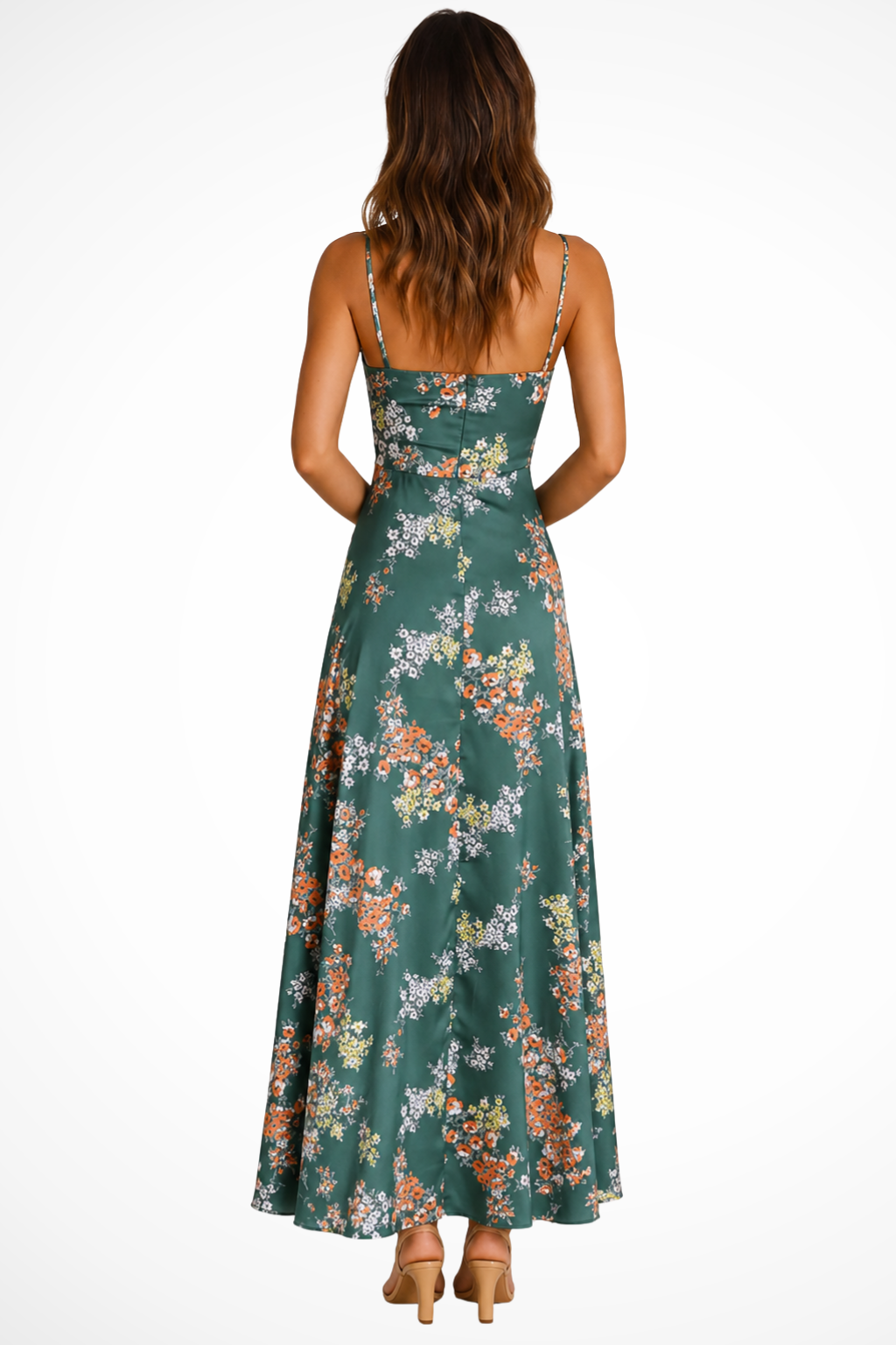 Back view of a green floral maxi dress with slender straps, a flowing A-line skirt, and a flattering fitted bodice.
