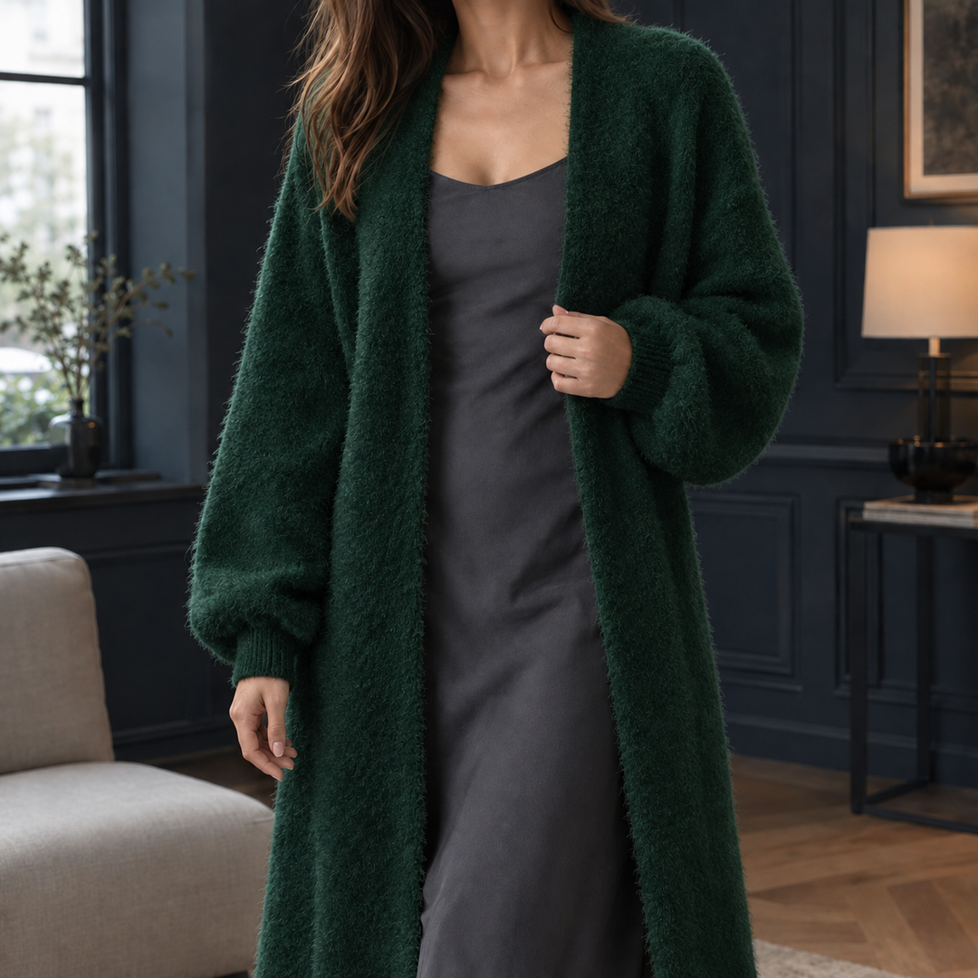 Plush dark green longline cardigan in a soft, fluffy knit with an open front and ribbed cuffs for cozy layering.