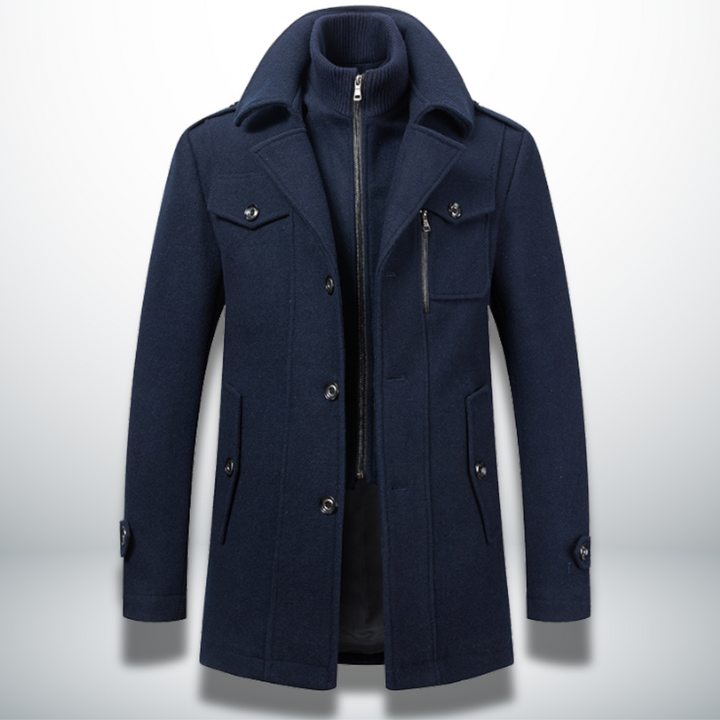 Navy blue wool-blend men's coat featuring a double collar, inner zip layer, button front, and chest pocket detailing.