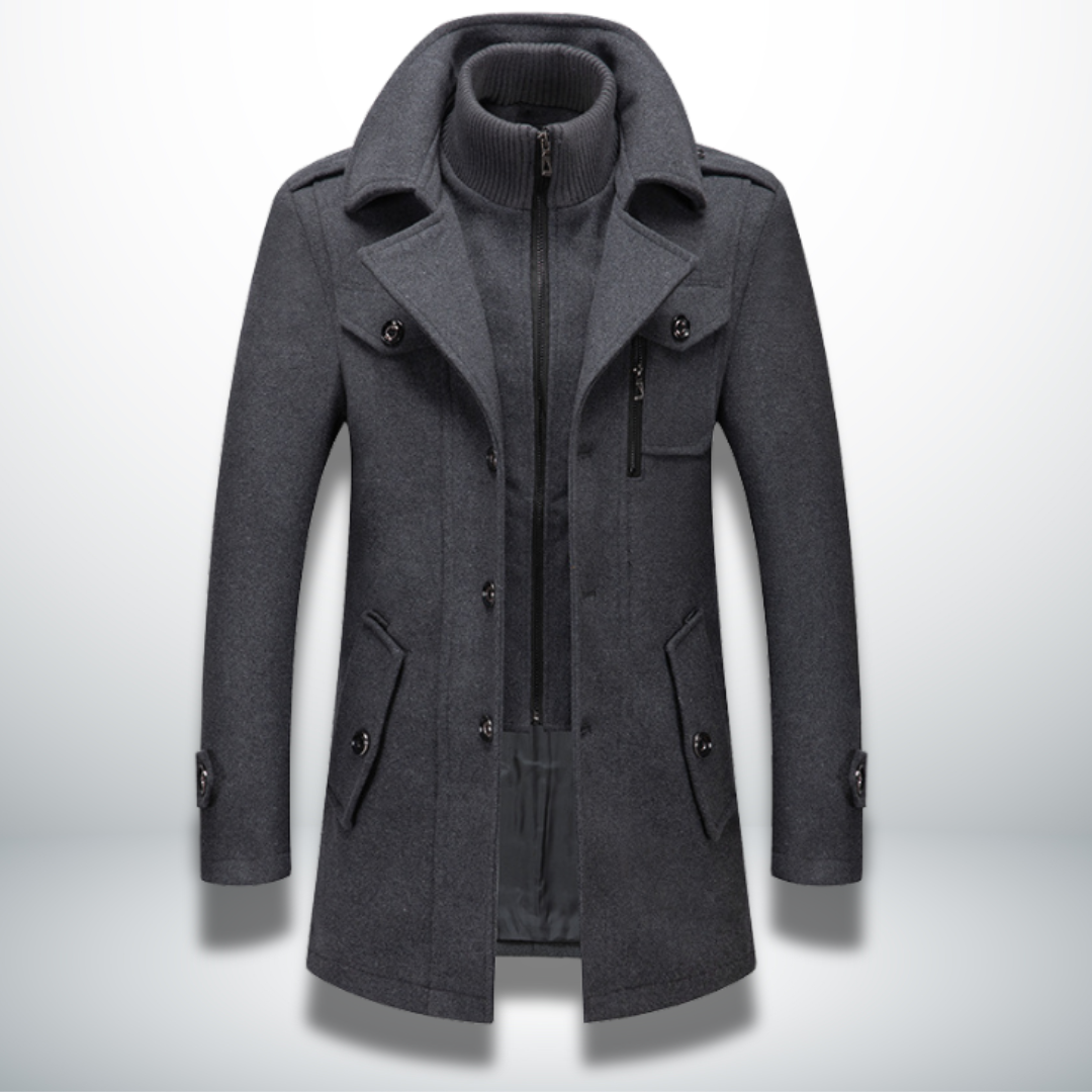 Charcoal grey men's wool-blend coat featuring a double collar, inner zip-up layer, button front, and utility pockets.
