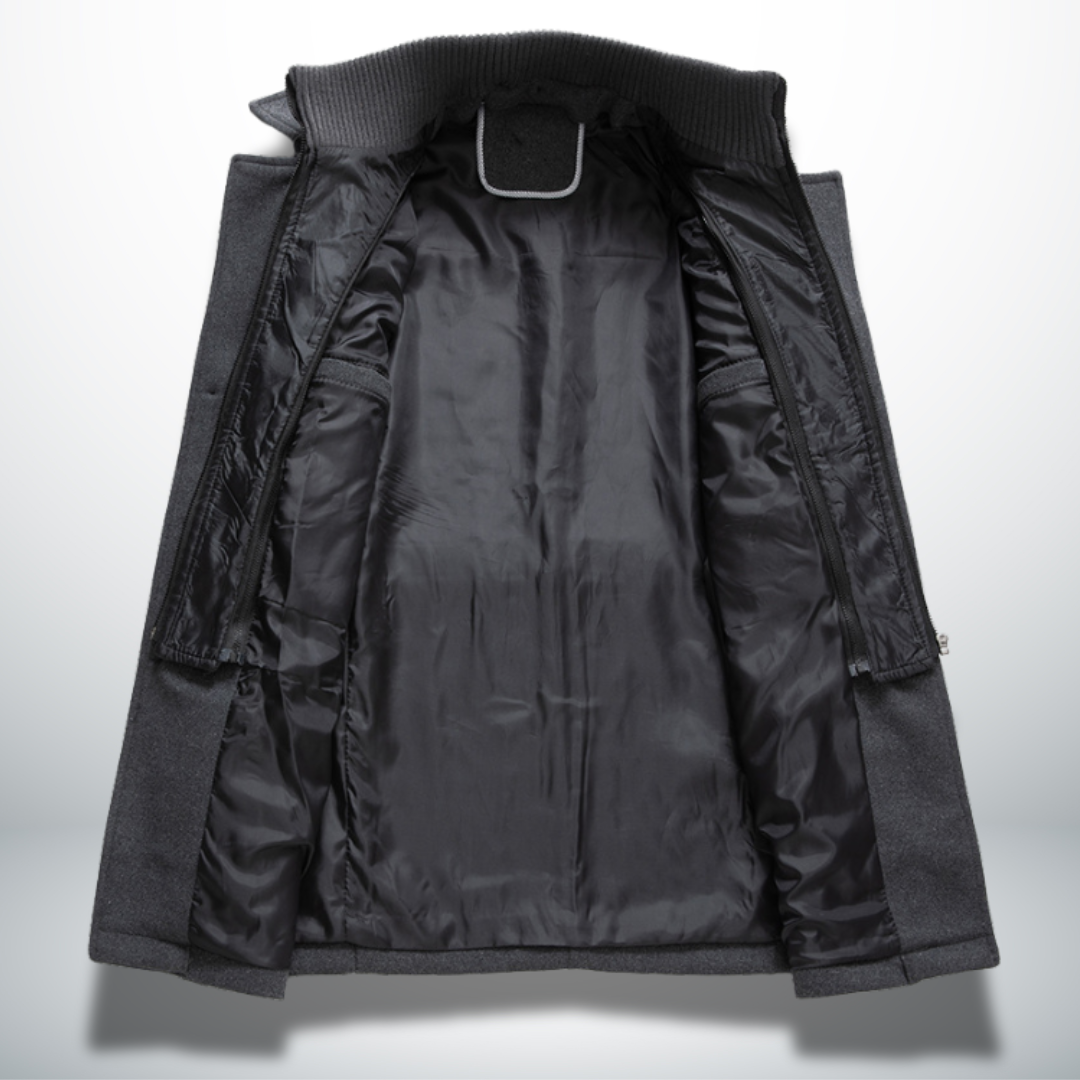 Interior view of a charcoal grey wool-blend men's coat featuring a black quilted lining and a structured double-collar design.