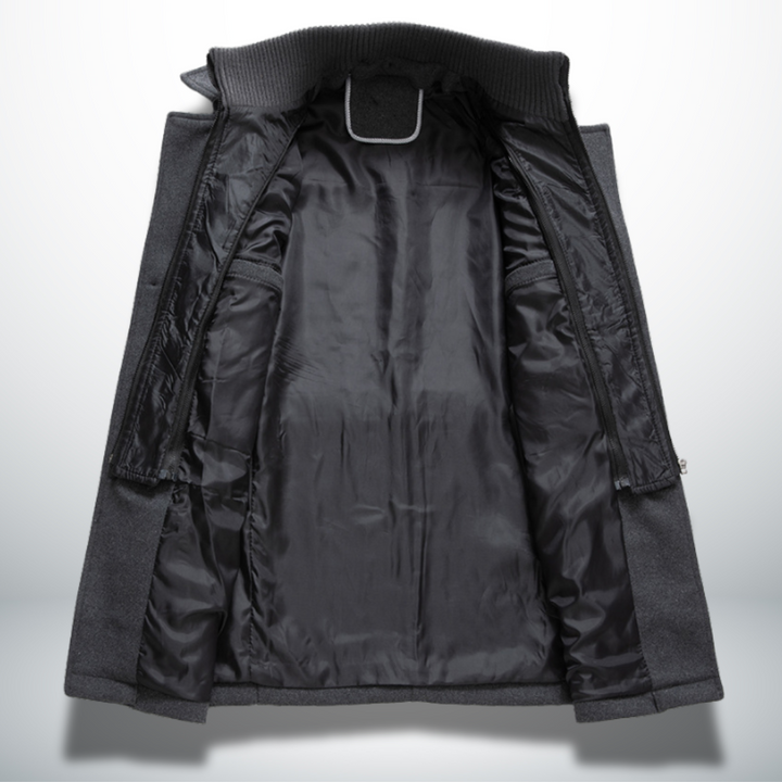 Interior view of a charcoal grey wool-blend men's coat featuring a black quilted lining and a structured double-collar design.